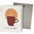 Load image into Gallery viewer, Clards eco-friendly greeting card - coffee cup illustration and text 'You fuel up my senses' on a white background - turns into 2 reusable sponge cleaning cloths.