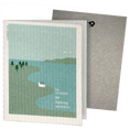Load image into Gallery viewer, Sponge Clard with a scenic design of a lake and trees, featuring text 'be present for fleeting wonders', on a white background.