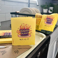 Load image into Gallery viewer, Yellow clards reusable swedish sponge cloth with purple birthday cake and colorful candles for eco cleaning