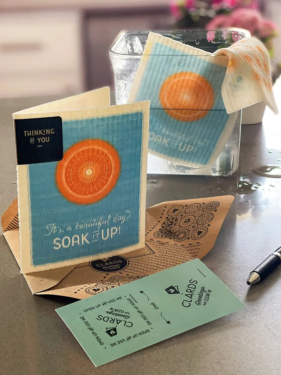 Soak iT Up Clard image of a greeting that says "it's a beautiful day-soak it up" turns into an eco-friendly reusable cleaning cloth. 