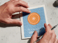 Load image into Gallery viewer, Blue textured cloth napkin with orange mandala design and white text perfect reusable cleaning cloths holiday greeting
