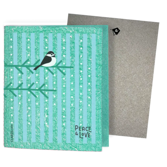 Teal and light blue striped reusable swedish sponge cloth with black and white chickadee on green branches peace and love print