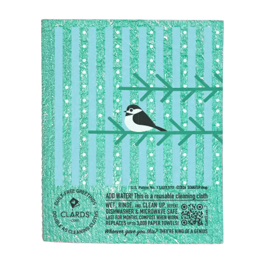 Teal glittery reusable swedish sponge cloth with black and white chickadee on green branches and vertical stripes