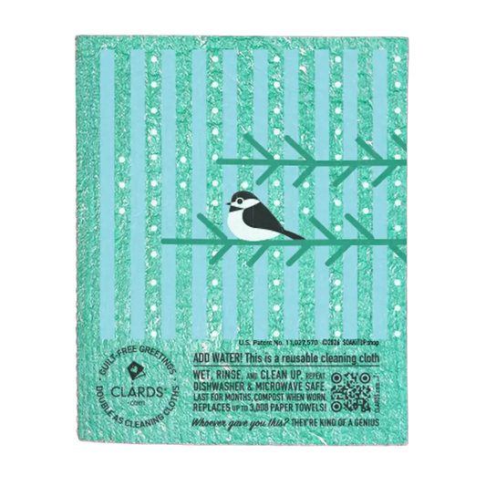 Teal glittery reusable swedish sponge cloth with black and white chickadee on green branches and vertical stripes