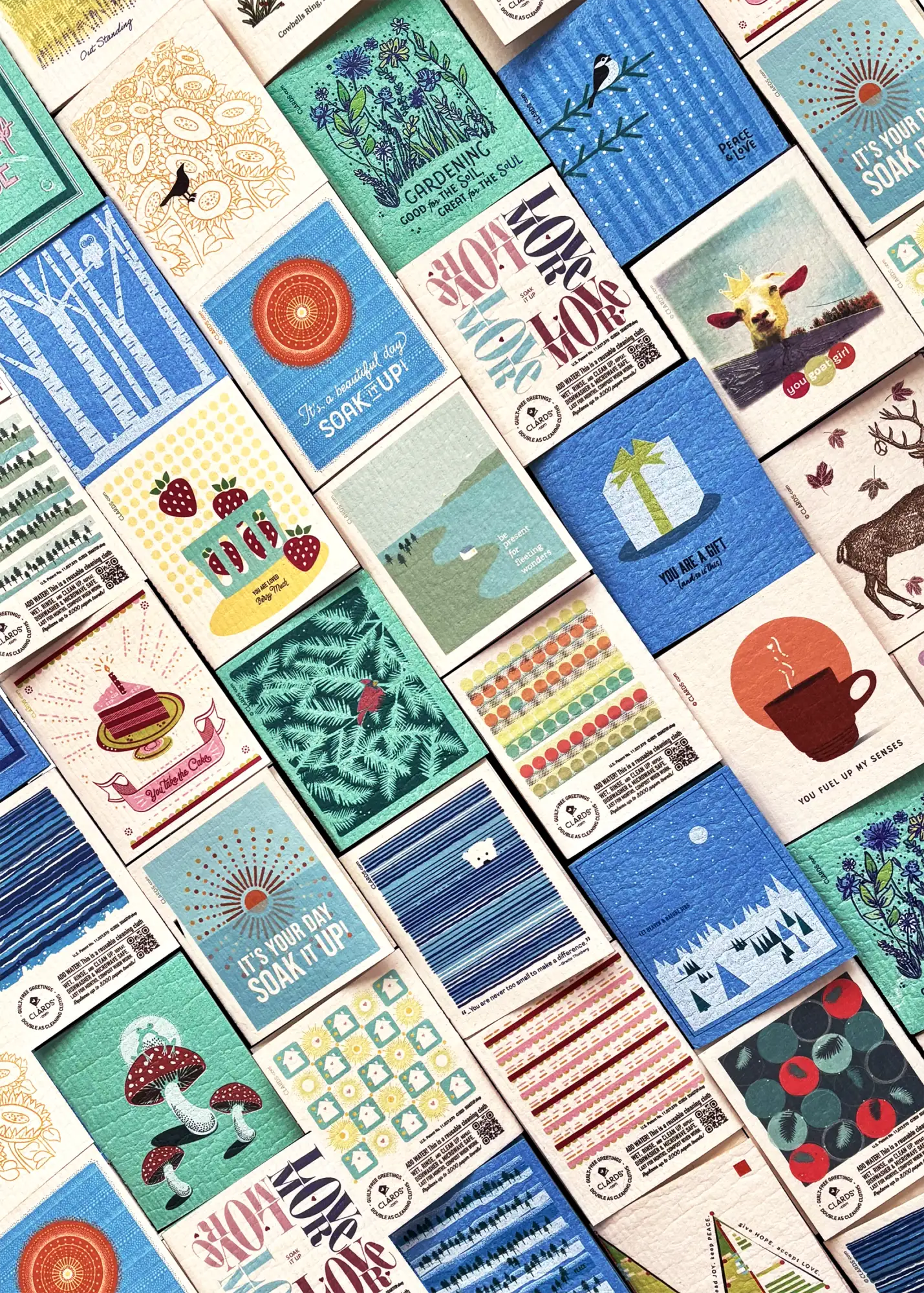 A collection of colorful, illustrated paper towels with various nature-themed and motivational designs.