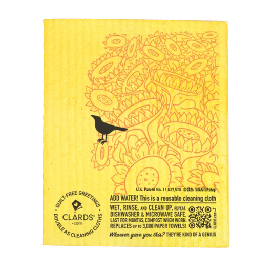 Yellow reusable cleaning cloth with black bird on orange sunflower tree design for sustainable greeting and status crow greeting